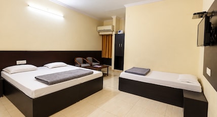 Hotel Moksha (500m From Ram Jhula) Room Type - Family Suite (3B) Hotel Moksha (500m From Ram Jhula) Room Type - Family Suite (3B)