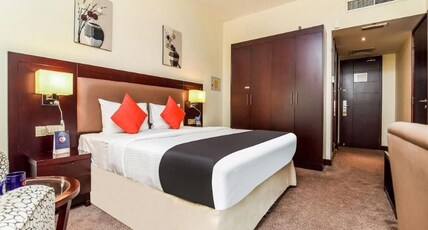 Landmark Summit  Room Type - Deluxe Room King Bed