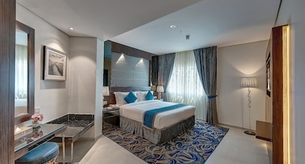 Omega Hotel, Bur Dubai Room Type - Executive Suite with Bathtub and Living Room Omega Hotel, Bur Dubai Room Type - Executive Suite with Bathtub and Living Room