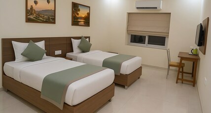 Abhiram hotels & resorts Room Type - Room wtih Twin Bed