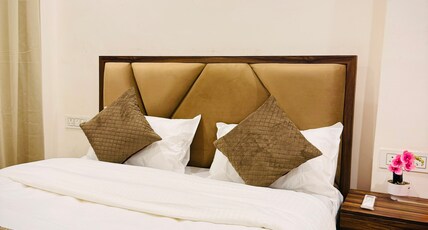 KashiYogi P. Guest House Room Type -  Deluxe Comfort Room