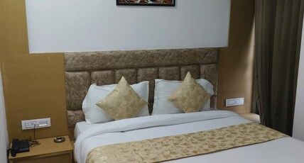 HOTEL SANGAM Room Type - Deluxe Bed Non Ac