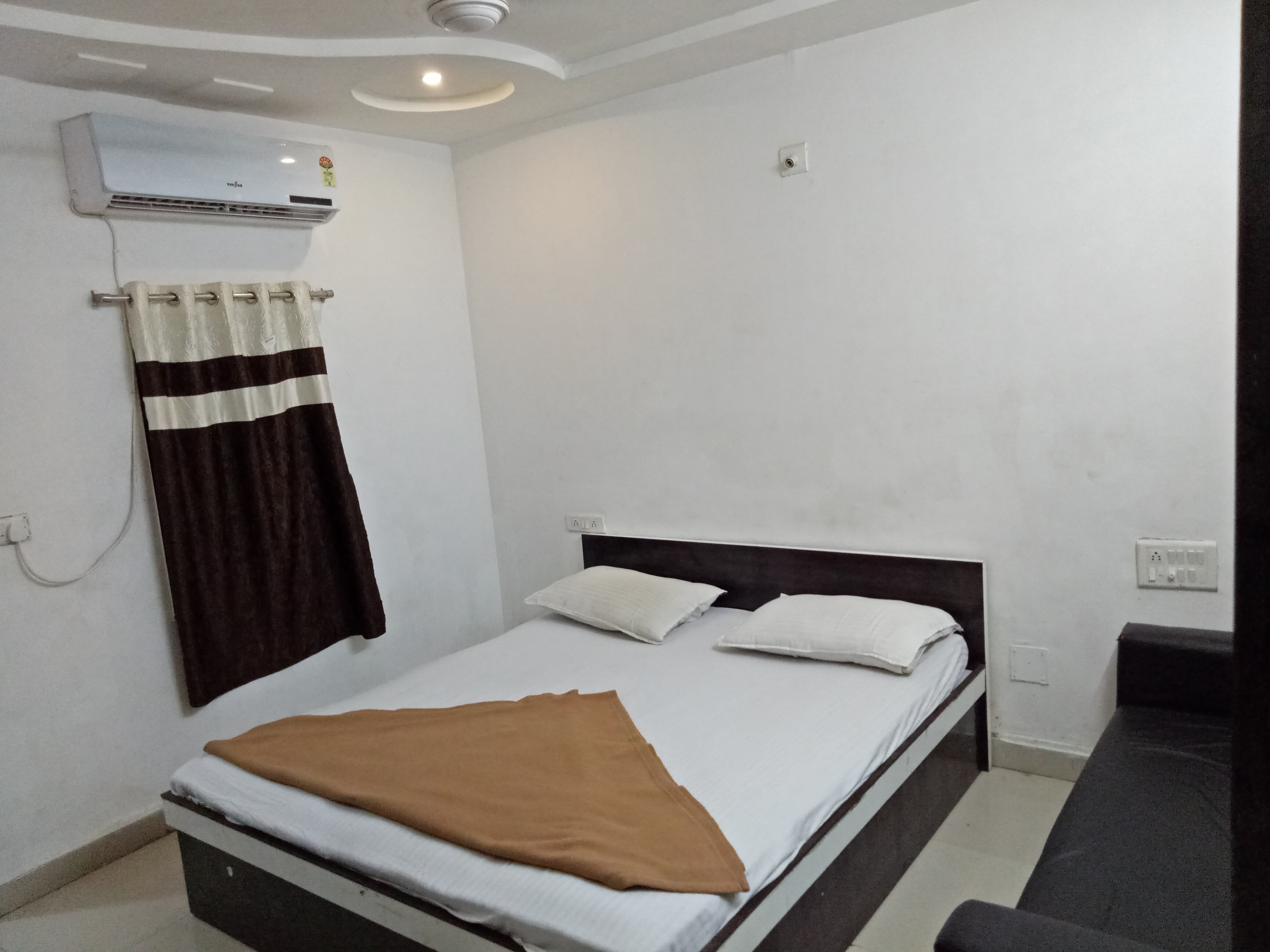 Hotel Tushar - Tap to explore photos