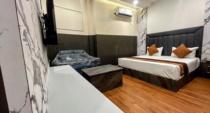 Hotel Sky Nest Room Type - Deluxe Rooms with King size Bed with Sofa