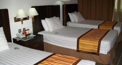 Knight Armour Hotel Room Type - Deluxe Triple Room