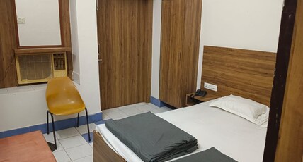 HOTEL TULSI PVT LTD Room Type - DELUXE ROOM