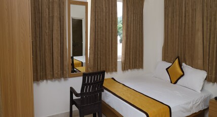 Sri Adhilakshmi Templeview Residency Room Type - Deluxe Room
