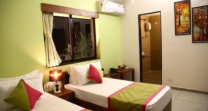Palette The Royal Castle Resort by CheckIn, Rajkot Room Type - Deluxe with Twin Bed