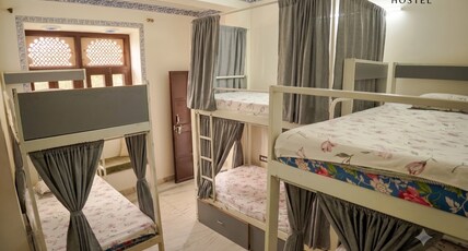 Whereabout Hostel |Rooftop Restaurant at Lake Pichola| Room Type - Superior AC 6 Bed Mixed Dorm
