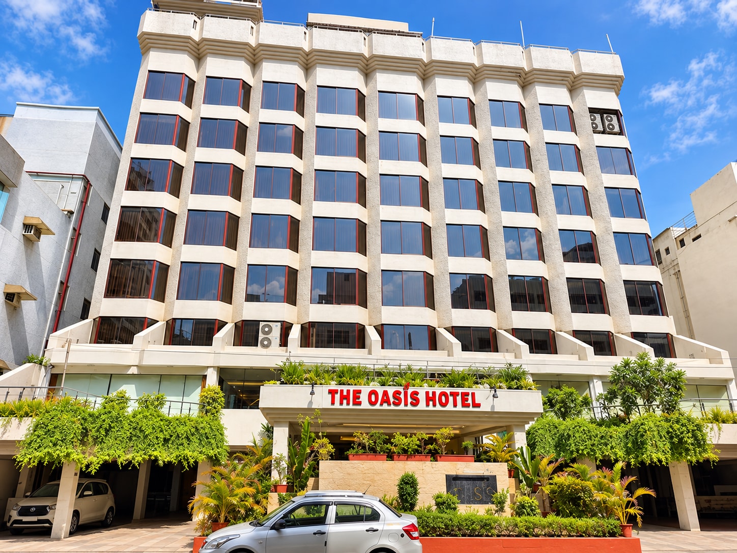 The Oasis Hotel - Tap to explore photos