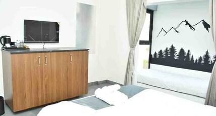CHINTHU LEGACY Room Type - Queen Bed Room with Hill View