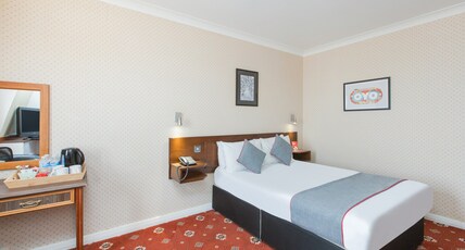 OYO Stade Court Hotel Room Type - Standard Quad Room with View OYO Stade Court Hotel Room Type - Standard Quad Room with View