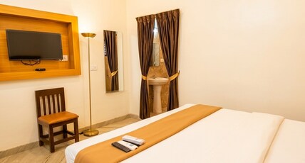 Chellam Inn Room Type - Deluxe Double Room AC