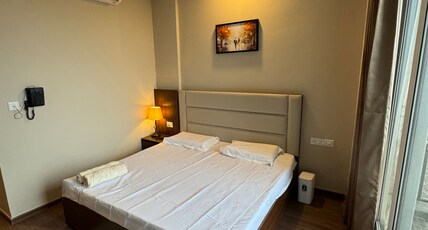 10 minutes away from ExpoMart The Hideaway Stays Room Type - Bedroom