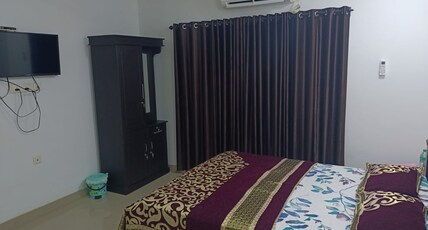Rain Home Stay | Artifical Rain Setup in Lush-green setting Room Type - Deluxe AC