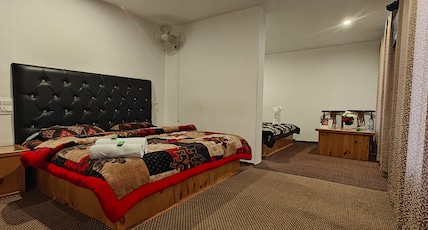 Hotel Shore Square Pahalgam. Room Type - Deluxe Four beded Family Room Hotel Shore Square Pahalgam. Room Type - Deluxe Four beded Family Room