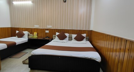 Hotel Raghunath  Room Type - Deluxe Three Bed
