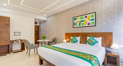 Treebo Cocoon Suites Room Type - Deluxe Room