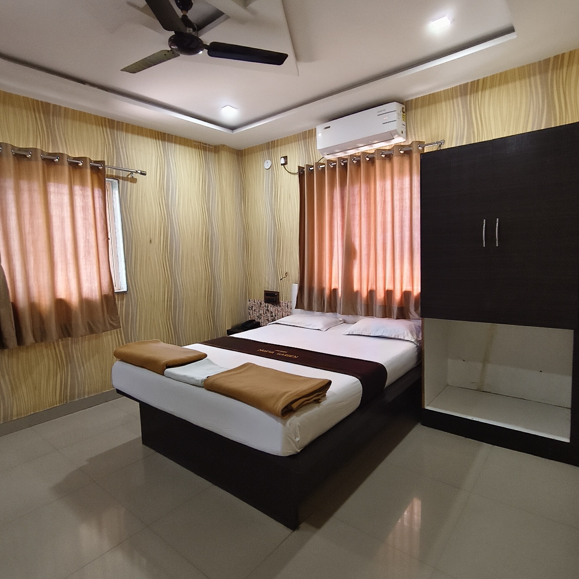 Hotel Morya Garden By WB Inn - Tap to explore photos