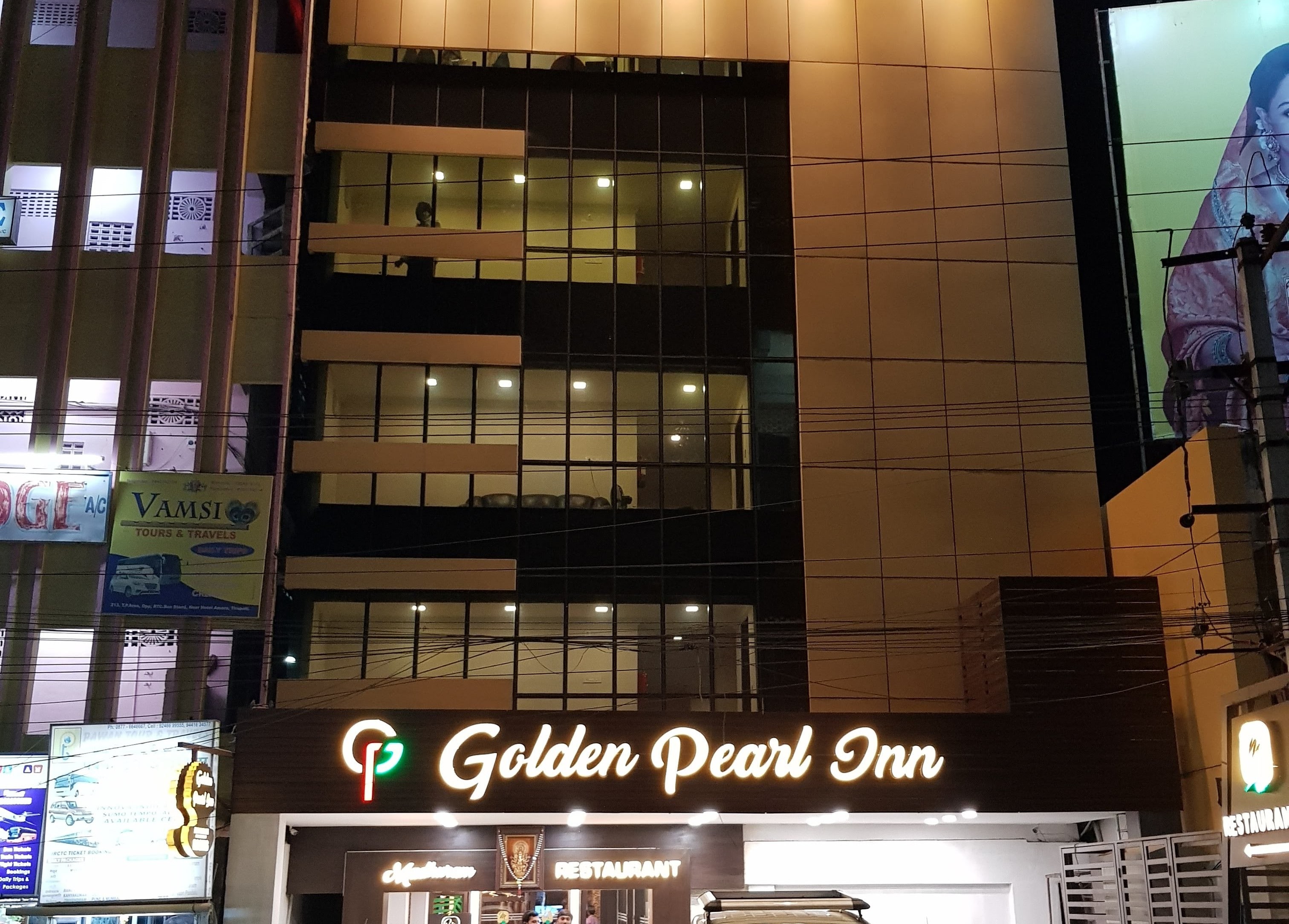 Hotel Golden Pearl Inn - Tap to explore photos