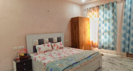 Om Homestay  
Hill View from top floor Room Type - Bedroom 1
