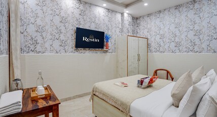 Restin Hotel Sector 63A & Sector 62 Room Type - Deluxe Room with Balcony