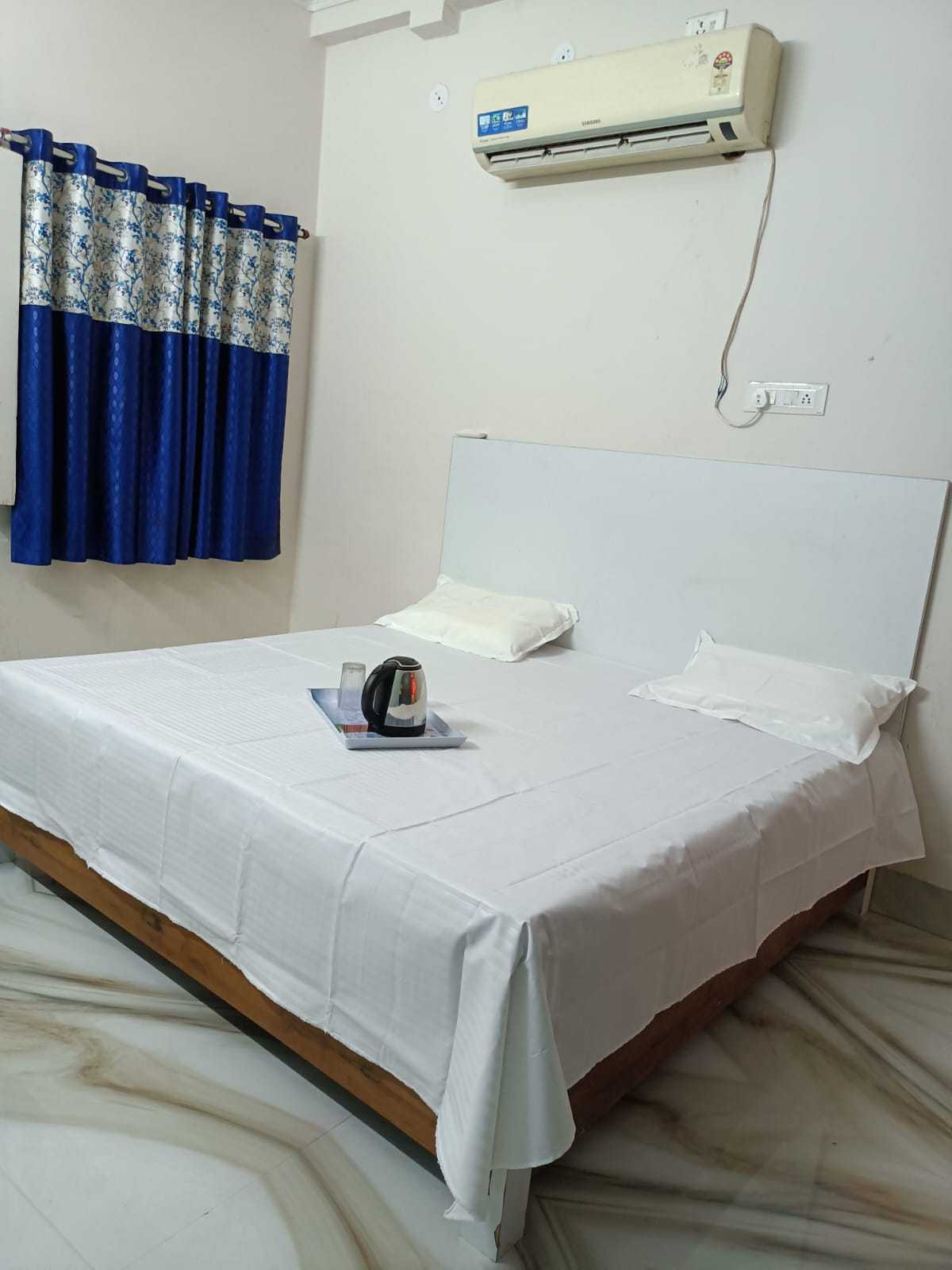 Spot ON Hotel Ayush - Tap to explore photos