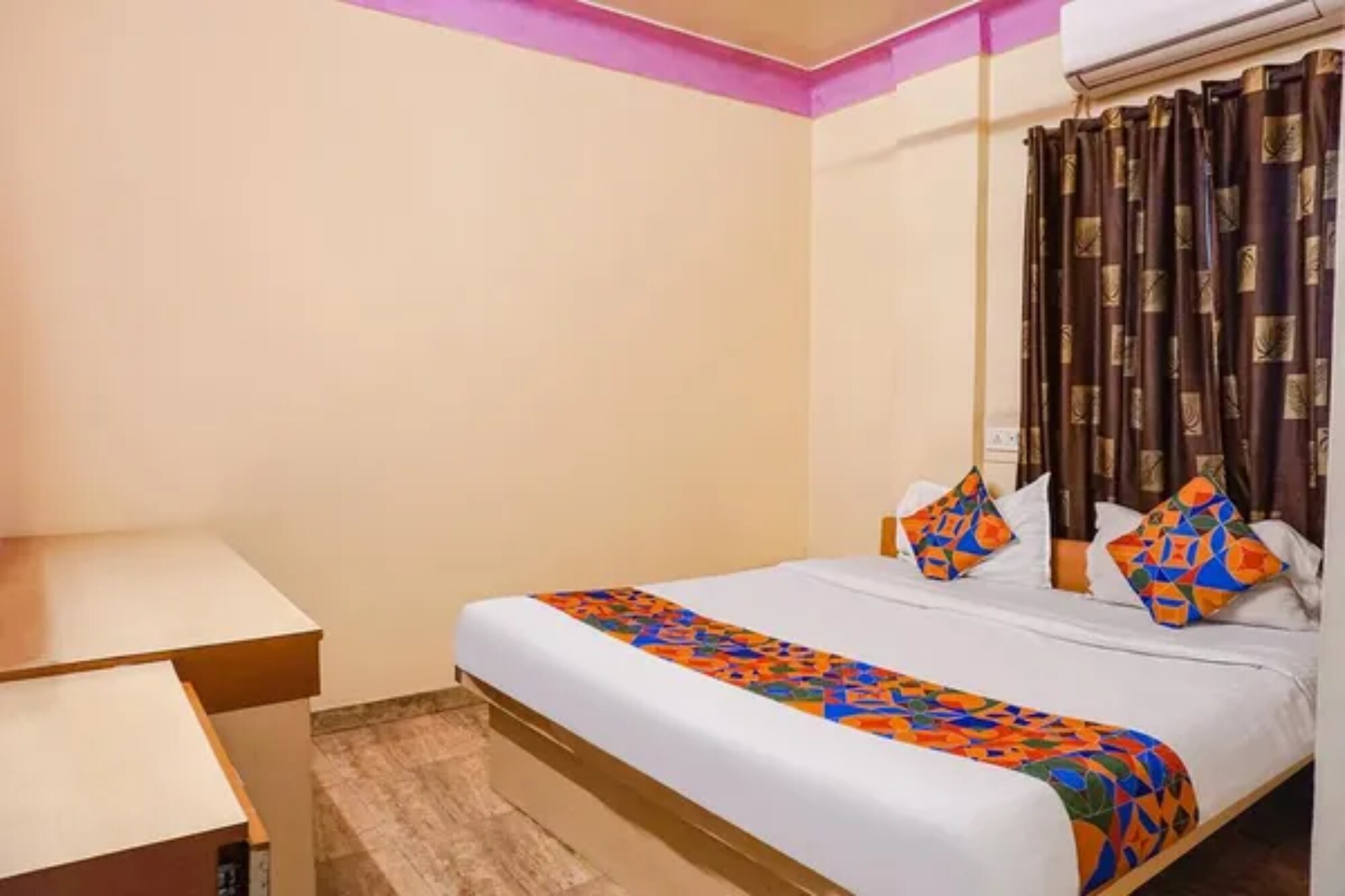 FabHotel Shloka - Tap to explore photos