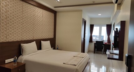 A&M Rooms and Residences Room Type - Deluxe King
