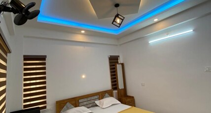 Grand Home Stay Room Type - Bedroom