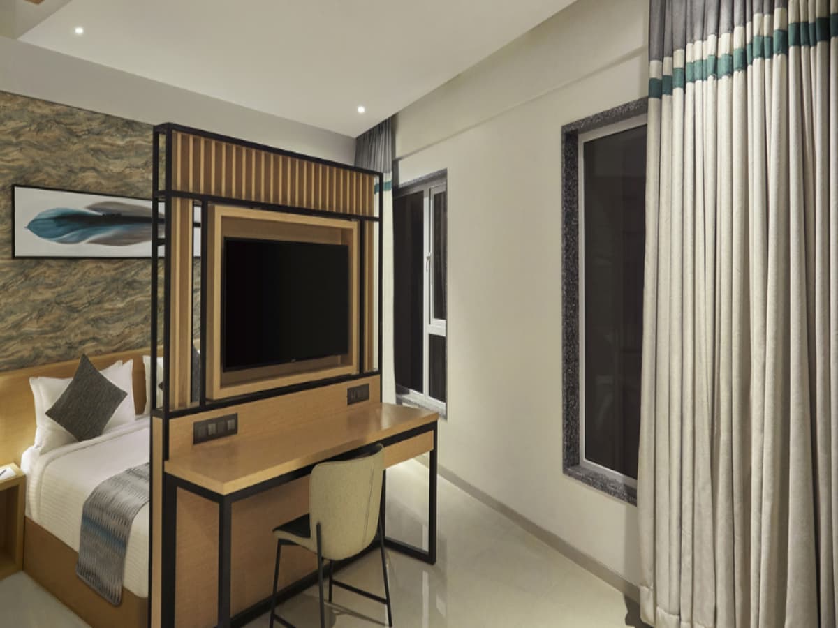 Click Hotel Bangalore, International Airport - Tap to explore photos
