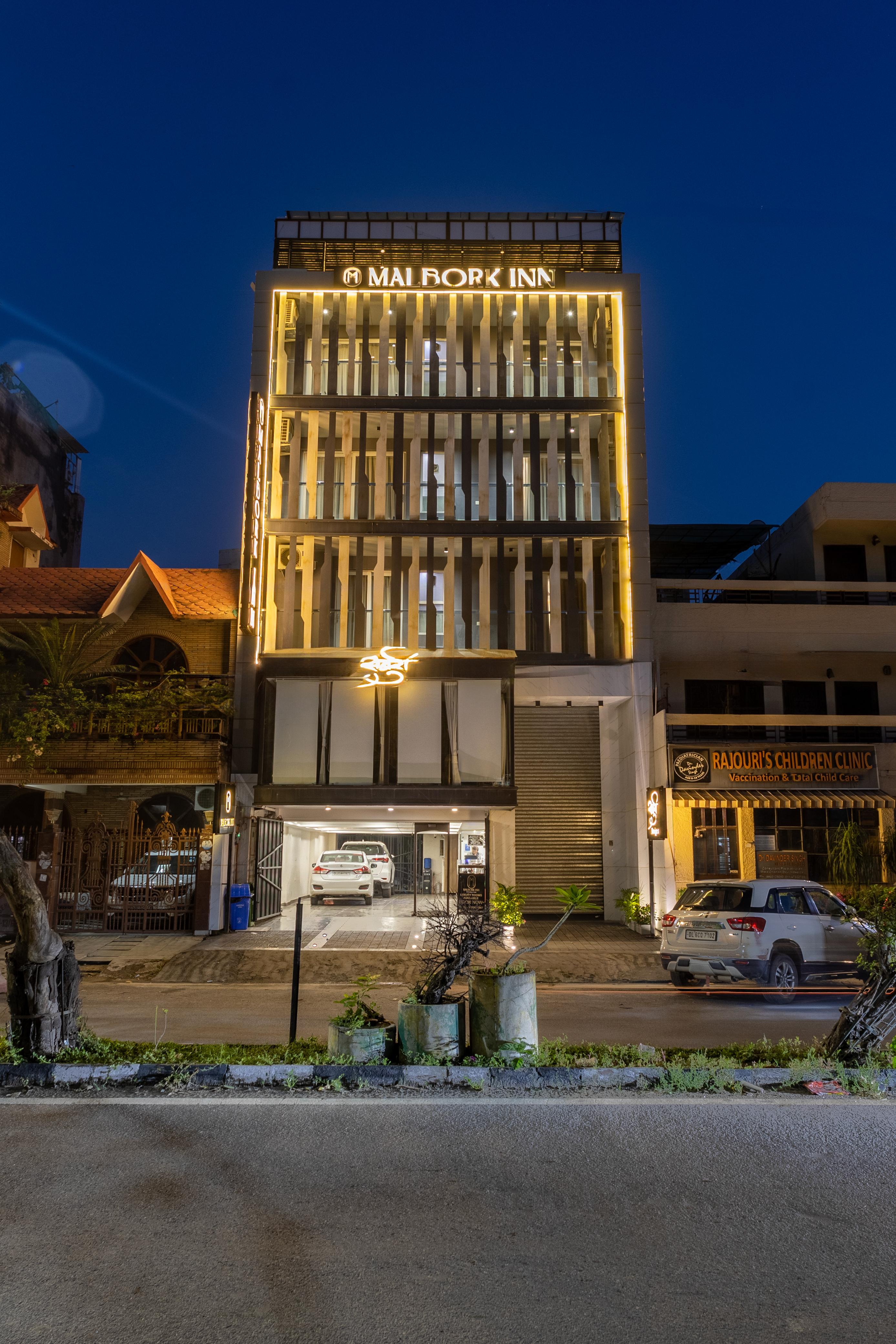 Hotel Malbork Inn @ Rajouri Garden, Delhi - Tap to explore photos