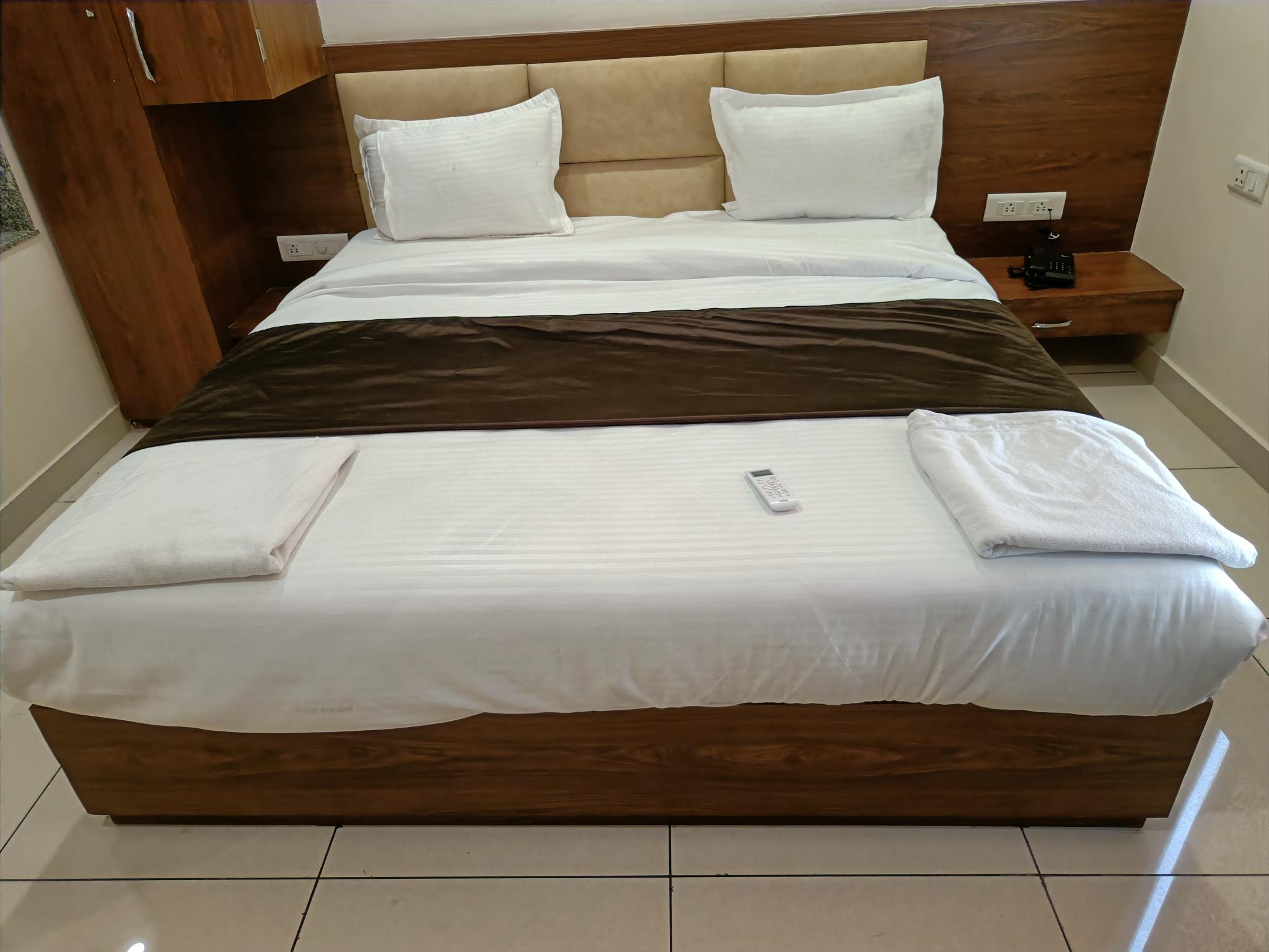 Hotel Shree Dev Prime - Tap to explore photos