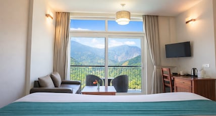 Shola Crown Resort - Munnar Room Type - Luxury Suite with Balcony Shola Crown Resort - Munnar Room Type - Luxury Suite with Balcony