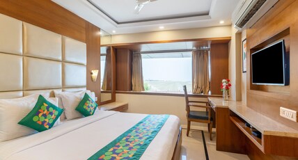 Treebo Premium Vinnie - Near Airport Room Type - Deluxe Room