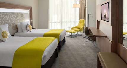 Novotel Jeddah Tahlia Room Type - Deluxe Room with 2 single beds and 1 sofa