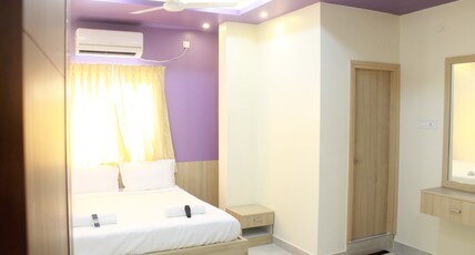 JFIVE RESIDENCY Room Type - Deluxe Room