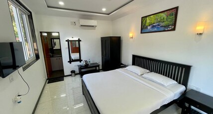 PALM PARADISE RESORT Room Type - Deluxe Room with AC