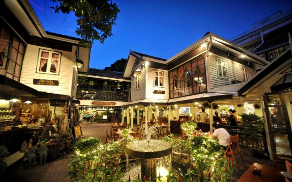 Silom Village Inn - Tap to explore photos