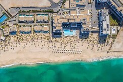 ELIVAAS Curated Beachfront Ultra 4BR Duplex | Sea & Burj Views
