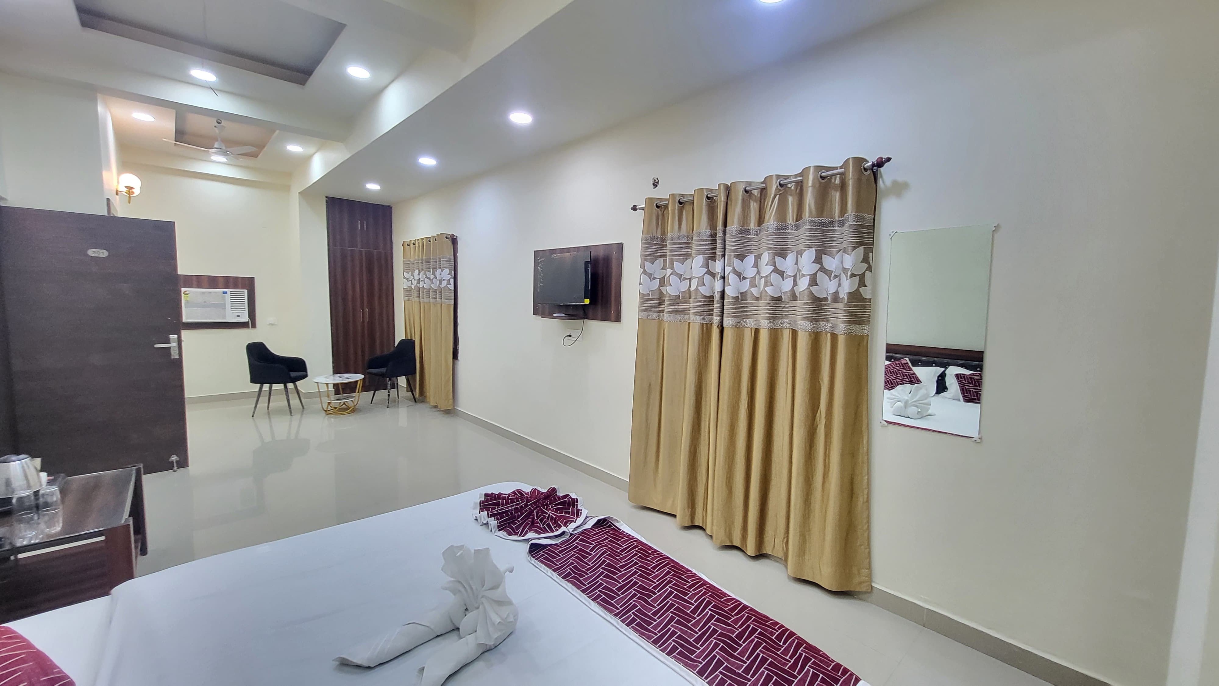 Hotel Adarsh | Near Saguna More - Tap to explore photos