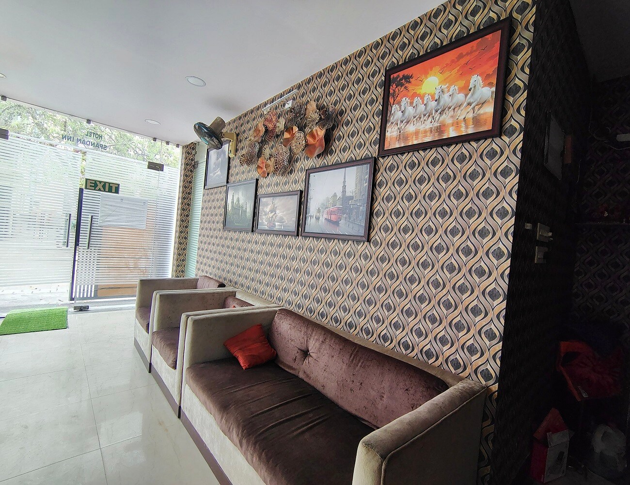 Star Spandan Inn Near Axis Mall - Tap to explore photos