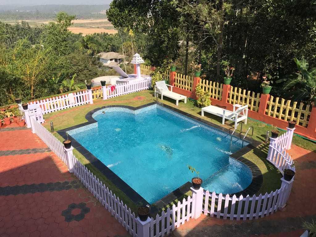 Wayanad Hill Top Holiday Home | Rooms & Pool - Tap to explore photos