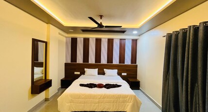 Hotel New Holiday Inn. Room Type - Deluxe AC Room