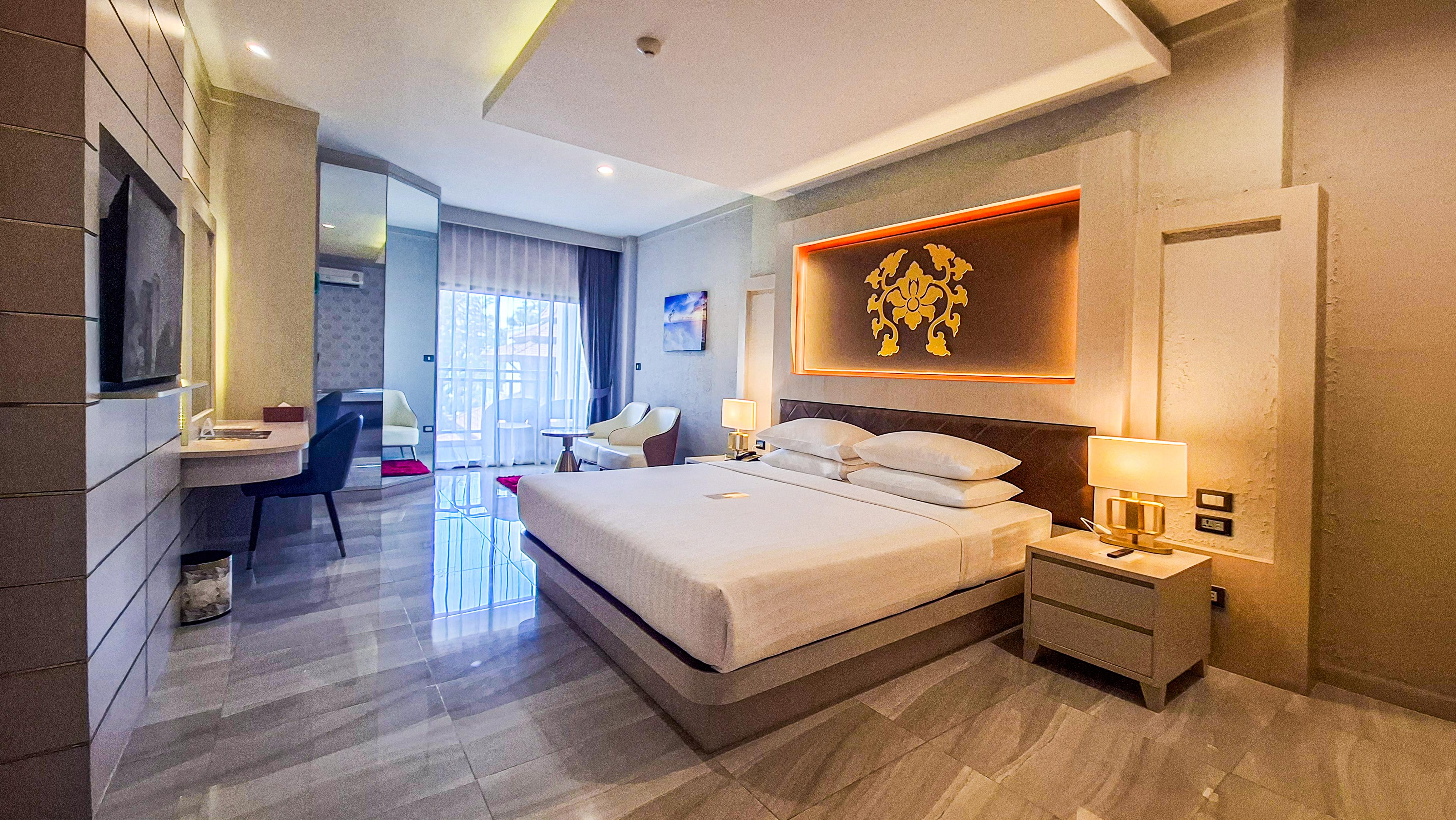 Quality Beach Resorts and Spa Patong - Tap to explore photos