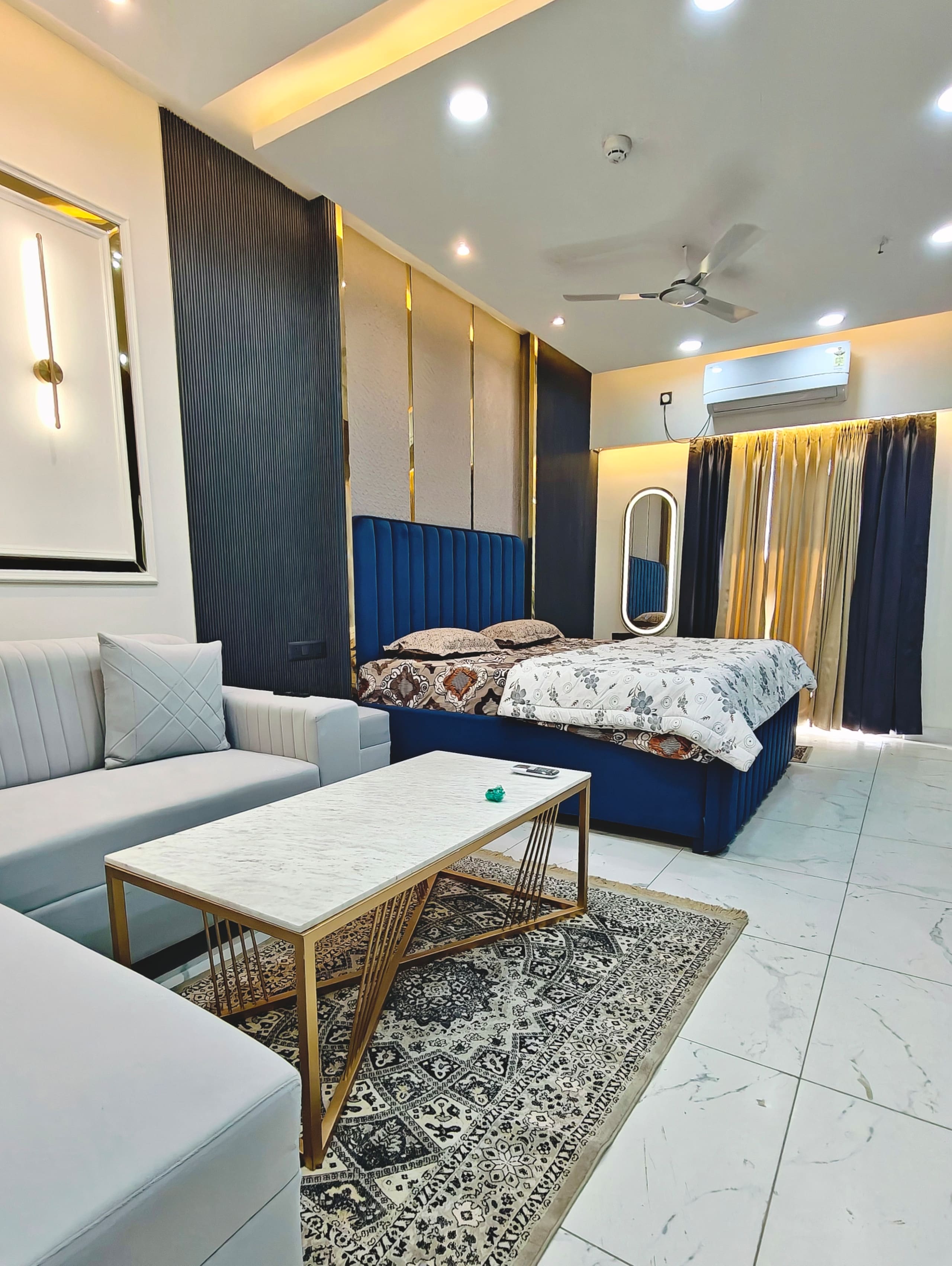 Premium Studio Near Gaur City Mall Cozy Stylish - Tap to explore photos
