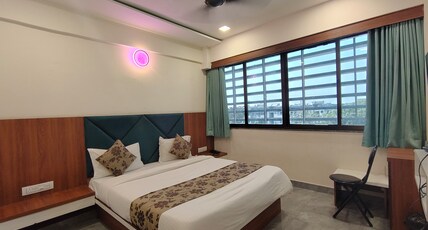 Hotel Earth Inn, Subhash Bridge, Ahmedabad Room Type - Deluxe Double Room