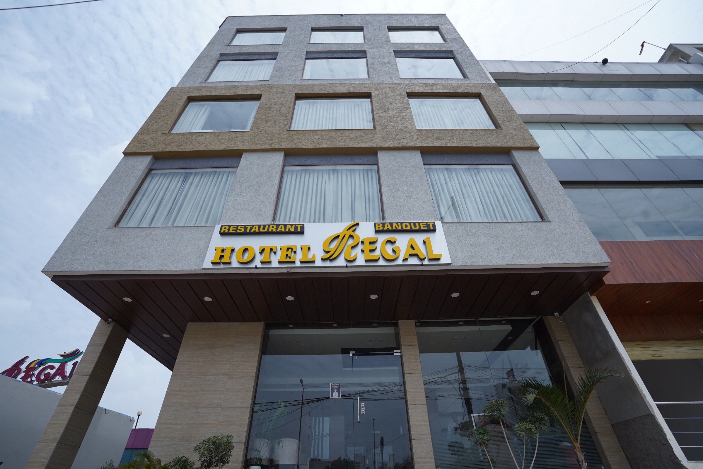 Hotel Regal By Rhytham - Tap to explore photos