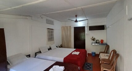 Grass Yellow Homestay | Kaziranga Room Type - Triple Bedded Family Room