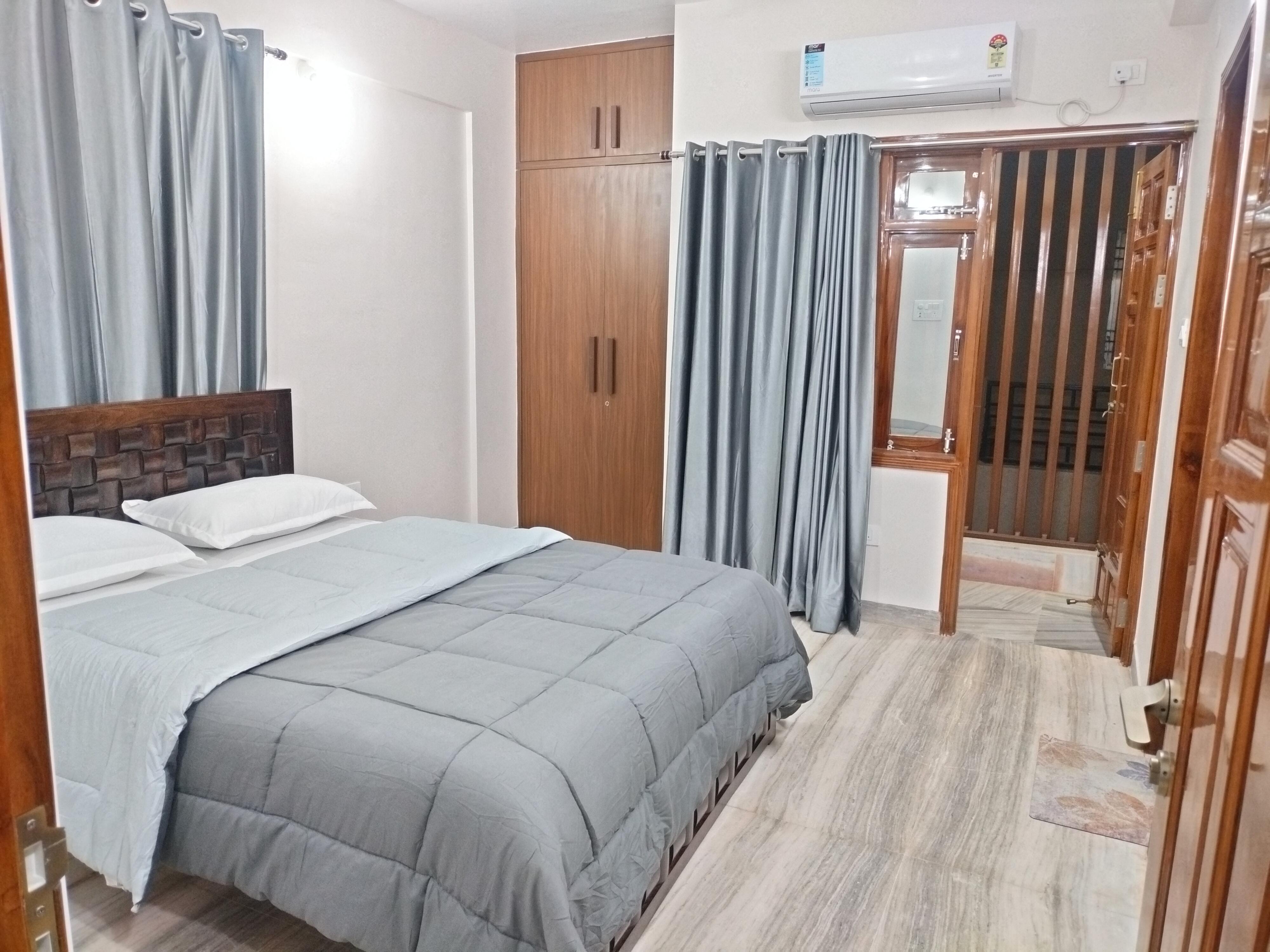 Modern 2BHK AC WiFi Parking | Nirmal Heights 102 - Tap to explore photos